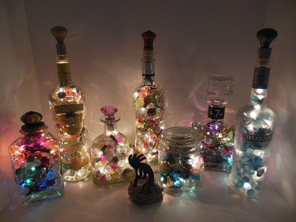 lighted wine bottles